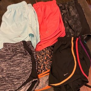 6 pairs of Nike Tempo Shorts